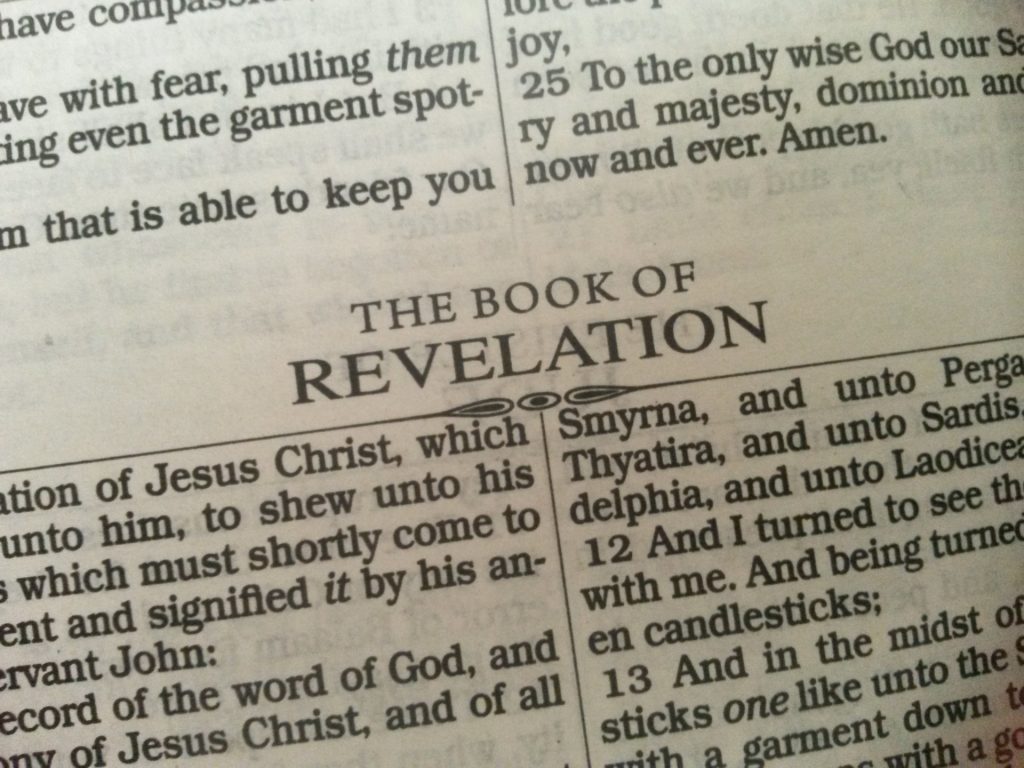 Page one of the KJV version of the book of Revelation. Before we read the first word, we bring assumptions to the text. 
Image by James Nichols from Pixabay.