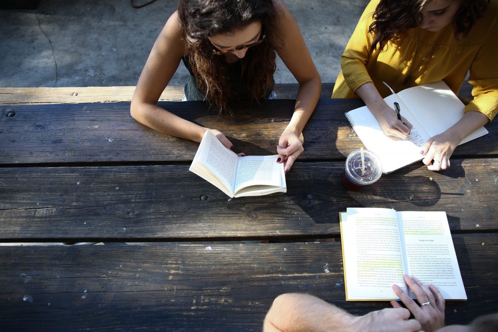 Young adults reading the Bible
Photo by Alexis Brown on Unsplash.. 